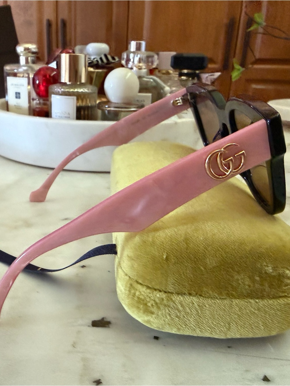 Gucci Pink-Arm Sunglasses with Gold GG Logo and Black Frames